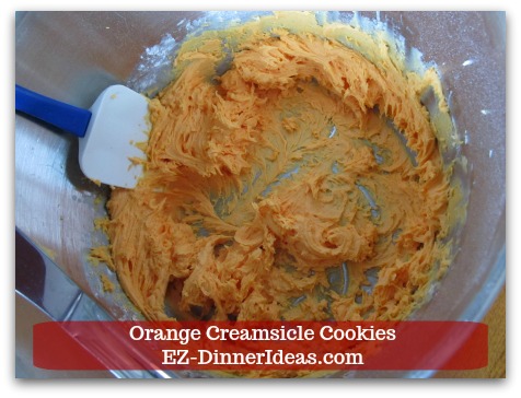 Easy Cake Mix Cookies Recipe | Orange Creamsicle Cookies - Beat butter, orange drink powder mix, confectionery sugar and milk to make icing.