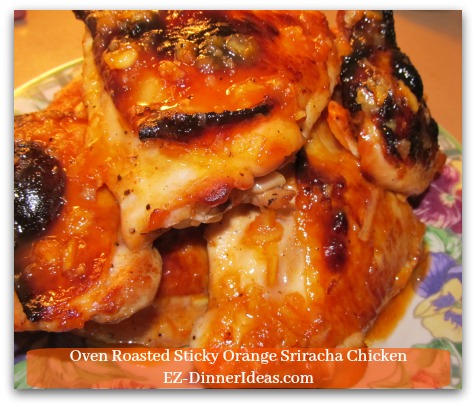 Oven Roasted Sticky Orange Sriracha Chicken - Pour a couple spoonful of sauce on top of chicken