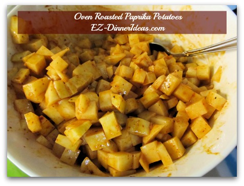 Baked Potato Hash | Oven Roasted Paprika Potatoes - Mix potatoes with oil and seasonings in a mixing bowl Baked Potato Hash | Oven Roasted Paprika Potatoes - Mix potatoes with oil and seasonings in a mixing bowl