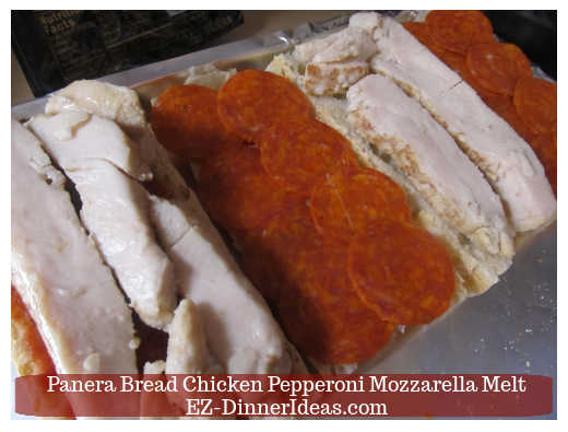 Adding pepperoni on the bread