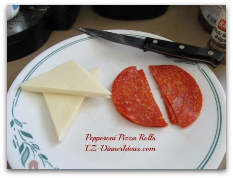 Pepperoni Pizza Rolls - stack sliced cheese and pepperoni separately and cut them into halves Pepperoni Pizza Rolls - stack sliced cheese and pepperoni separately and cut them into halves