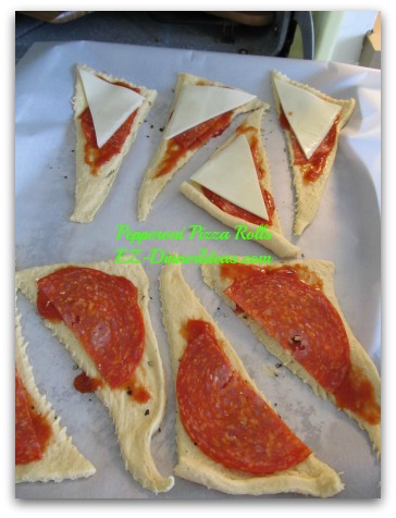 Pepperoni Pizza Rolls - Add sliced Mozzarella or white cheese and pepperoni on top Pepperoni Pizza Rolls - Add sliced Mozzarella or white cheese and pepperoni on top