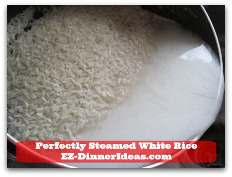 Perfectly Steamed White Rice - Just tilt the pot slightly and gently to pour out the water.  Keep rinsing until the water is clear