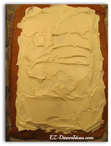 Spread the cream cheese evenly on the cake Spread the cream cheese evenly on the cake