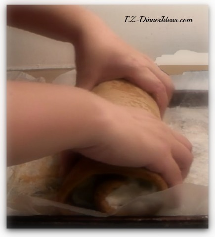 Once the pumpkin roll is formed, apply the pressure and squeeze the roll lightly to help its shape forming Apply a little bit of pressure and squeeze the roll lightly to help its shape forming