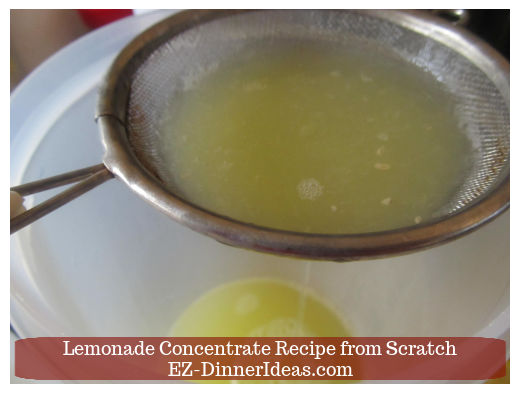 Pouring lemon juice through strainer