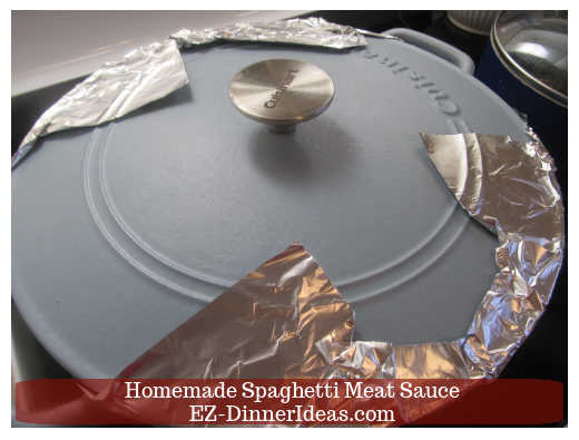 lid covering sauce in the pot