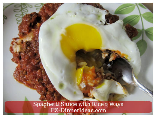 Spaghetti sauce, white rice and fried egg being served