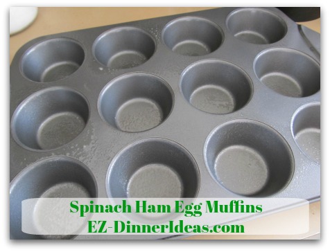 Spinach Ham Egg Muffins - Coat muffin pan liberally with no-stick cooking spray