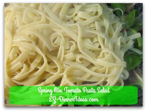 Spring Mix Tomato Pasta Salad - Top with cooked pasta
