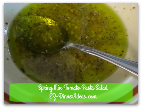 Spring Mix Tomato Pasta Salad - Combine with garlic, vinegar and extra virgin olive oil.  Put dressing aside.
