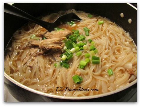 Thai chicken noodle bowl, an Asian tasty recipe, is ready on the table for a family in 30 minutes.