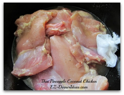 Lay the chicken on top of the pineapple