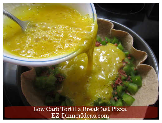 Top it with beaten eggs Top it with beaten eggs