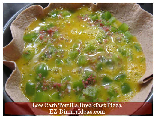 Tortilla breakfast pizza assembled Tortilla breakfast pizza assembled
