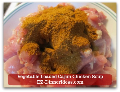 Kale Chicken Soup | Vegetable Loaded Cajun Chicken Soup - Add 1 tbsp Cajun seasoning and toss to coat.